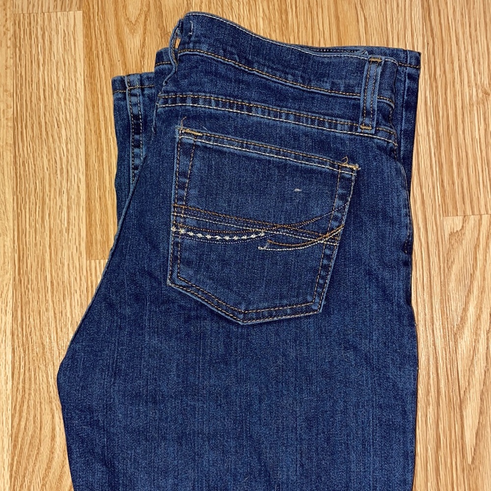 AS REAL AS WRANGLER CLASSIC FIT BOOT CUT JEANS